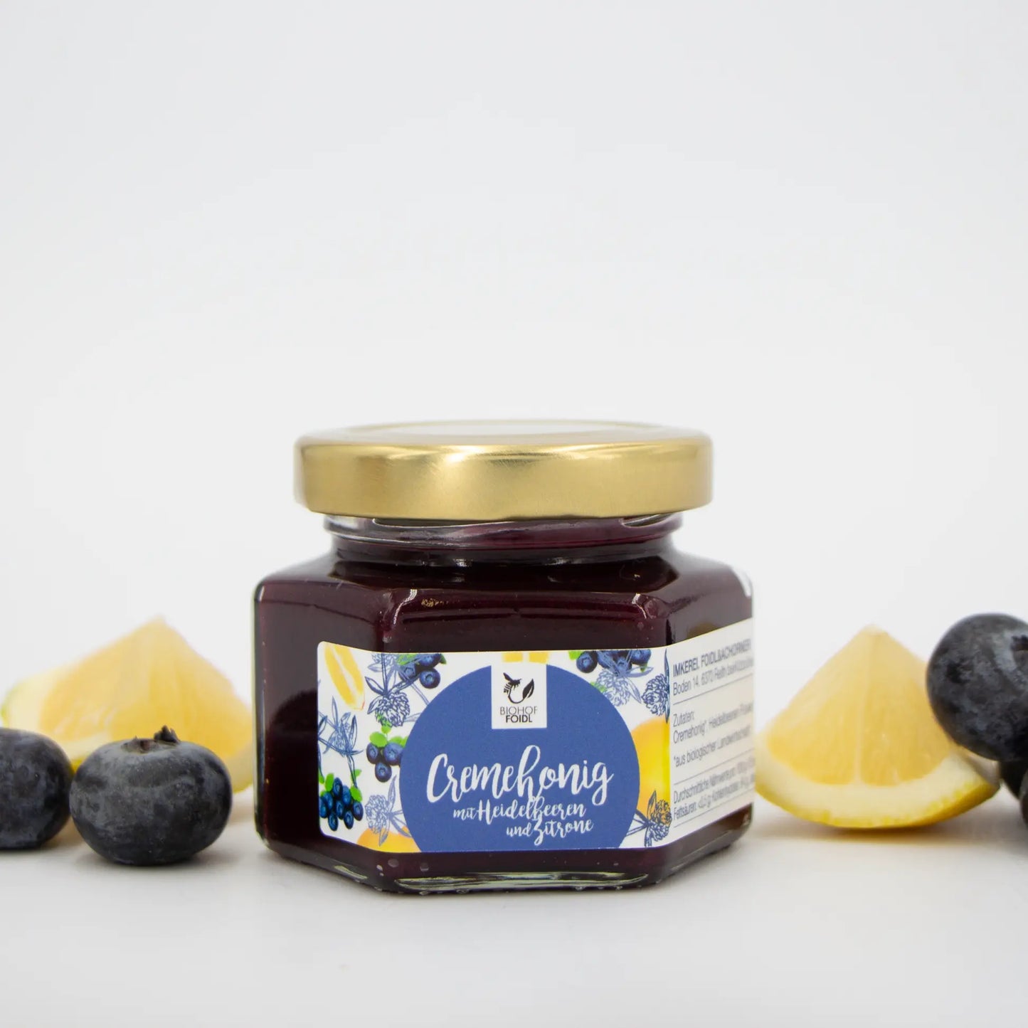 Cremehonig mit Moosbeeren uns Zitrone