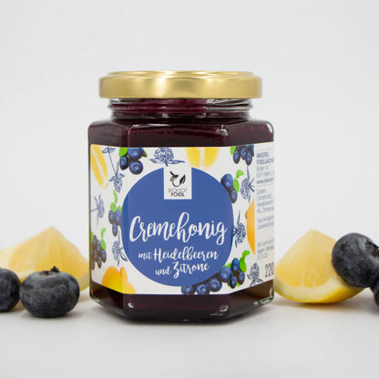 Cremehonig mit Moosbeeren uns Zitrone
