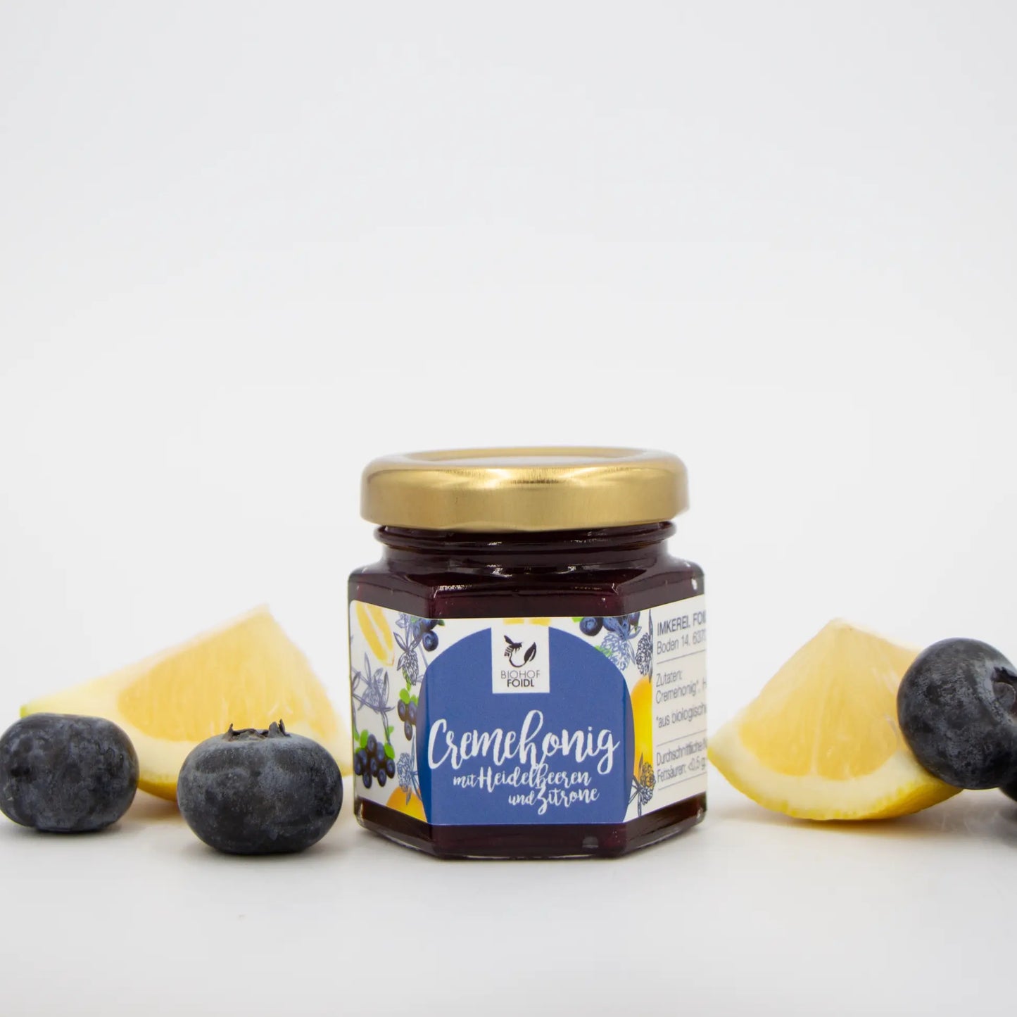 Cremehonig mit Moosbeeren uns Zitrone
