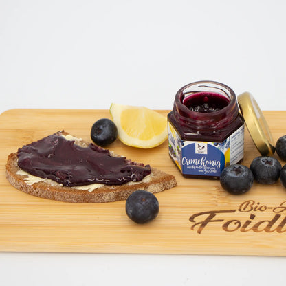 Cremehonig mit Moosbeeren uns Zitrone